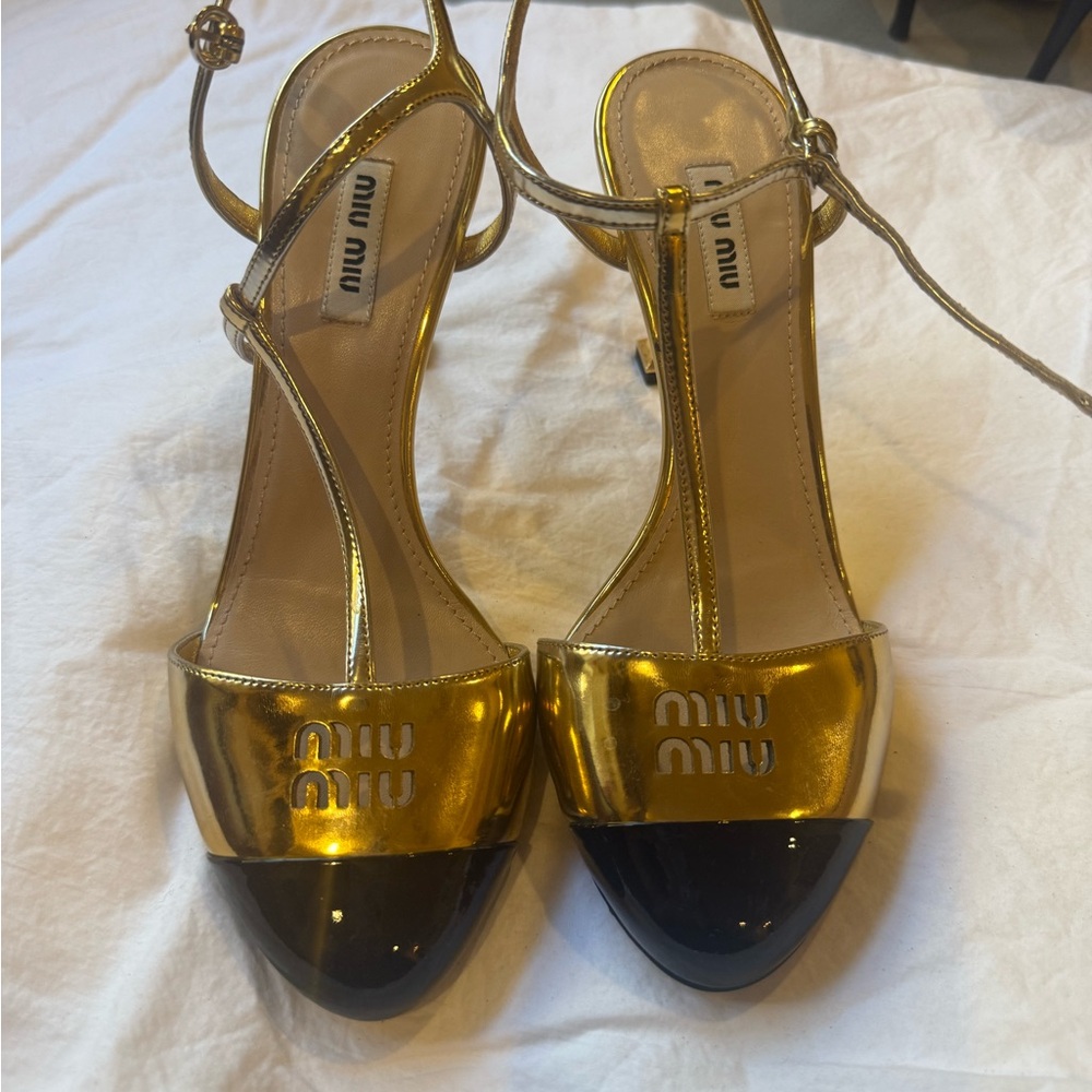 Miu Miu Metallic Gold Logo Strappy Heels 38 | Black Patent Cap Toe